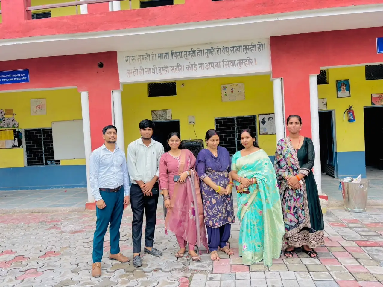 Teachers at the school entrance